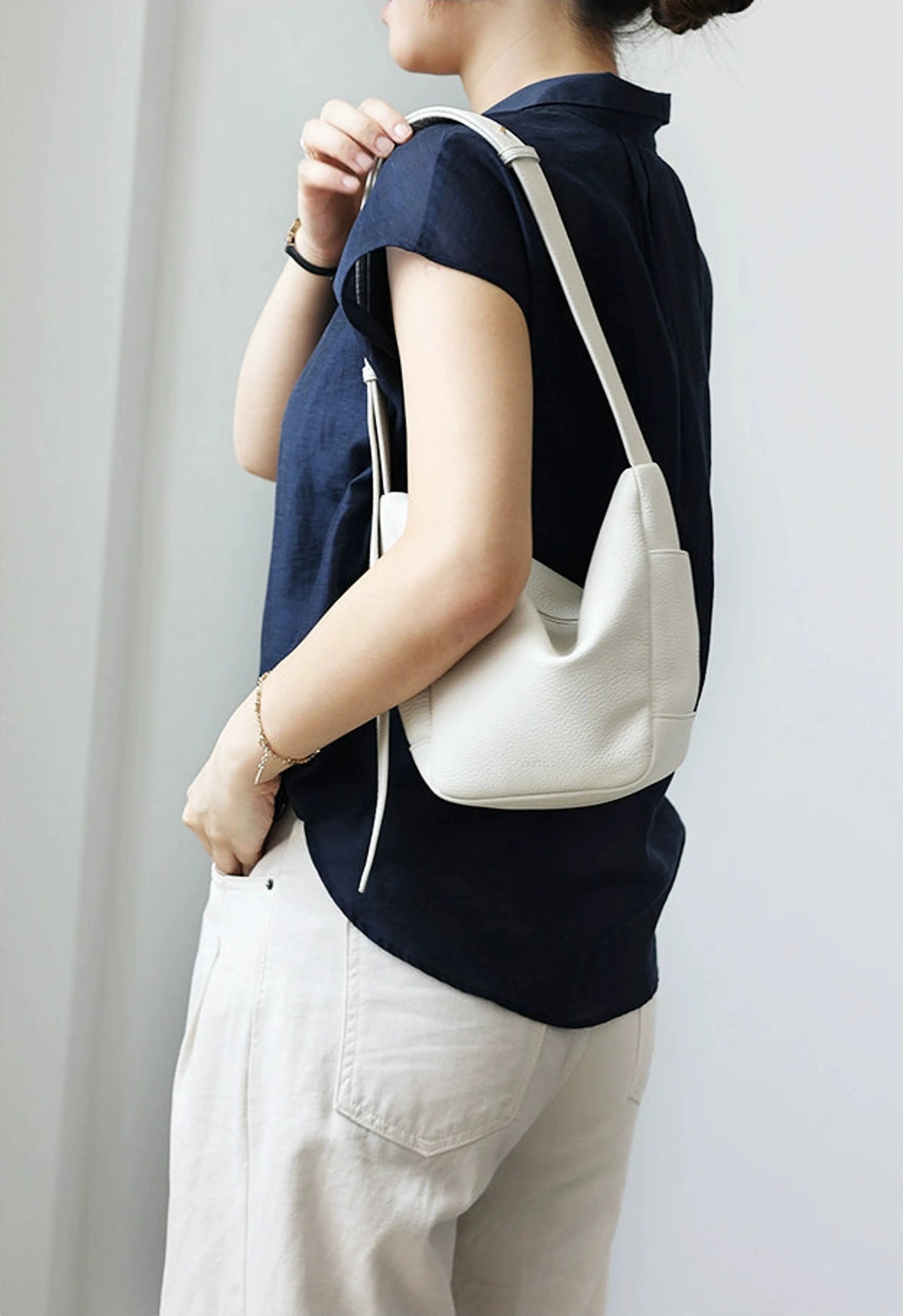 Minimalist Pebbled Leather Bucket Bag - Image 11